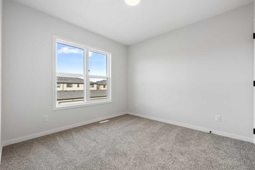 83 Wolf Hollow Rise Se, Calgary, AB - Indoor Photo Showing Other Room