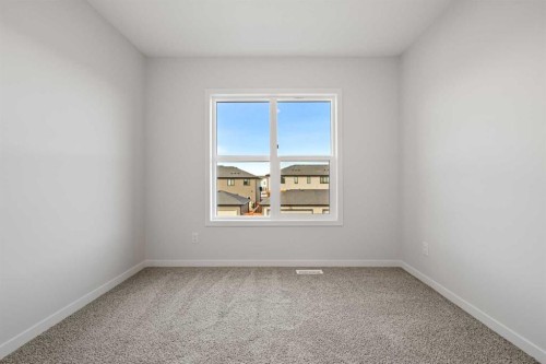 83 Wolf Hollow Rise Se, Calgary, AB - Indoor Photo Showing Other Room