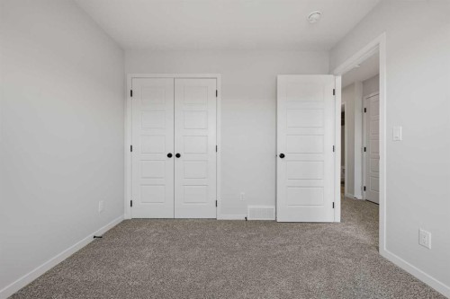 83 Wolf Hollow Rise Se, Calgary, AB - Indoor Photo Showing Other Room