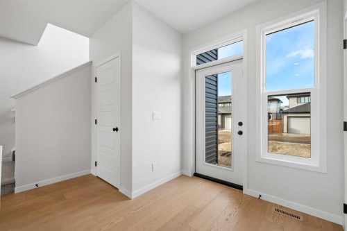 83 Wolf Hollow Rise Se, Calgary, AB - Indoor Photo Showing Other Room