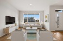 83 Wolf Hollow Rise Se, Calgary, AB  - Indoor Photo Showing Living Room 
