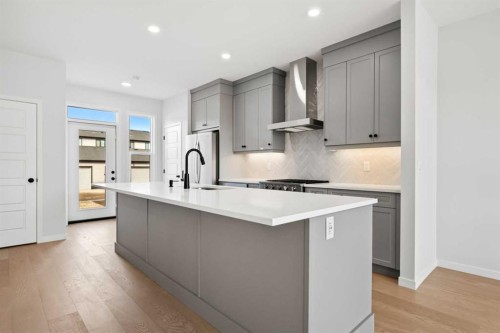 83 Wolf Hollow Rise Se, Calgary, AB - Indoor Photo Showing Kitchen With Upgraded Kitchen