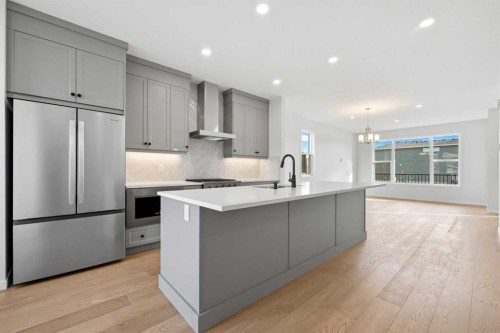 83 Wolf Hollow Rise Se, Calgary, AB - Indoor Photo Showing Kitchen With Upgraded Kitchen