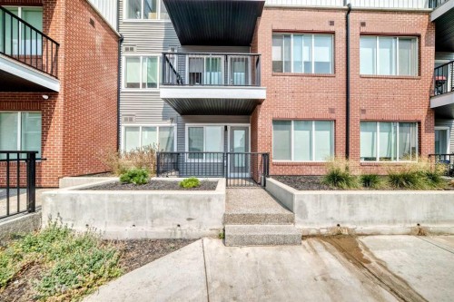 2110-6 Merganser Drive West, Chestermere, AB - Outdoor With Facade