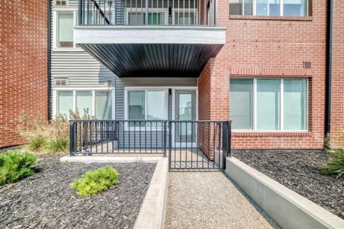 2110-6 Merganser Drive West, Chestermere, AB - Outdoor With Deck Patio Veranda With Exterior