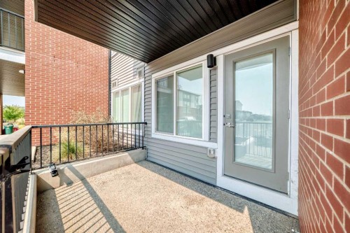 2110-6 Merganser Drive West, Chestermere, AB - Outdoor With Deck Patio Veranda With Exterior