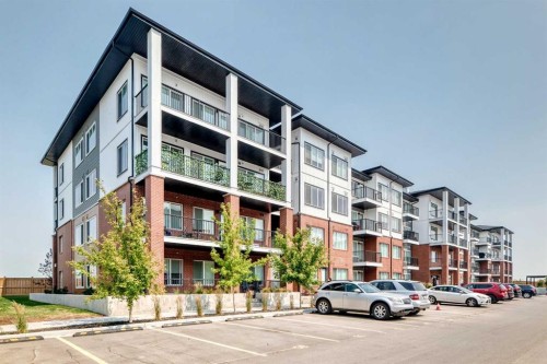 2110-6 Merganser Drive West, Chestermere, AB - Outdoor With Facade
