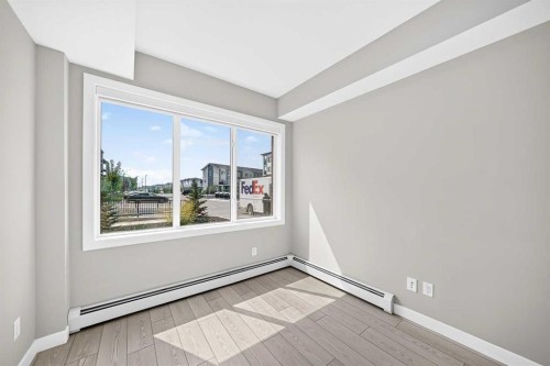 2110-6 Merganser Drive West, Chestermere, AB - Indoor Photo Showing Other Room
