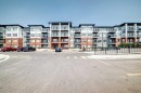 2110-6 Merganser Drive West, Chestermere, AB  - Outdoor With Facade 