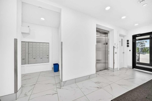 2110-6 Merganser Drive West, Chestermere, AB - Indoor Photo Showing Other Room