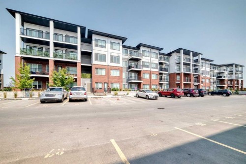 2110-6 Merganser Drive West, Chestermere, AB - Outdoor With Facade