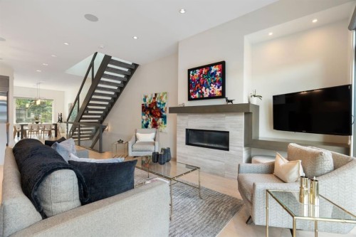 2014 48 Avenue Sw, Calgary, AB - Indoor Photo Showing Living Room With Fireplace