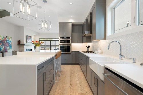 2014 48 Avenue Sw, Calgary, AB - Indoor Photo Showing Kitchen With Double Sink With Upgraded Kitchen
