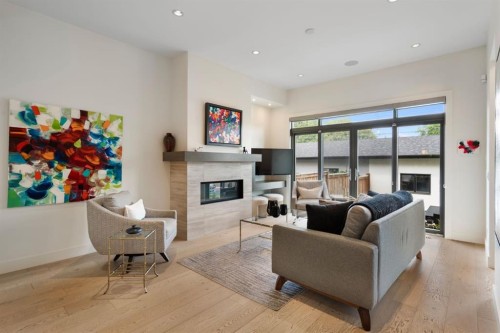 2014 48 Avenue Sw, Calgary, AB - Indoor Photo Showing Living Room With Fireplace