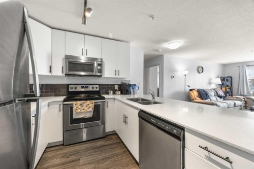 2210-181 Skyview Ranch Manor Ne, Calgary, AB - Indoor Photo Showing Kitchen With Stainless Steel Kitchen With Double Sink