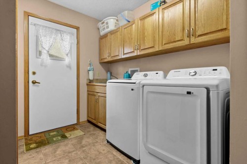 40 Scenic Ridge Place Nw, Calgary, AB - Indoor Photo Showing Laundry Room