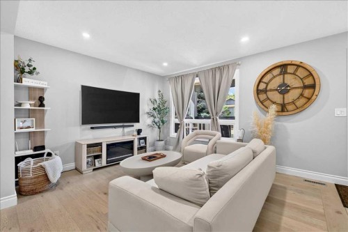 75 Shawglen Way Sw, Calgary, AB - Indoor Photo Showing Living Room