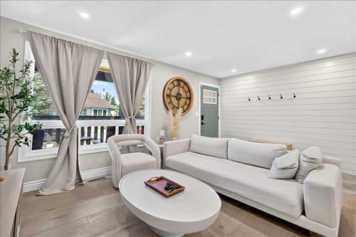 75 Shawglen Way Sw, Calgary, AB - Indoor Photo Showing Living Room