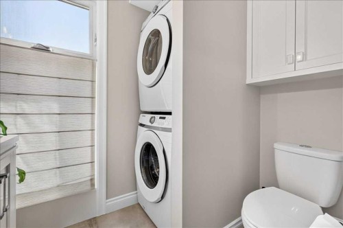 75 Shawglen Way Sw, Calgary, AB - Indoor Photo Showing Laundry Room