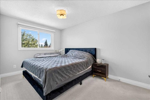 75 Shawglen Way Sw, Calgary, AB - Indoor Photo Showing Bedroom