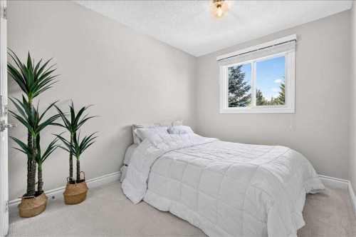 75 Shawglen Way Sw, Calgary, AB - Indoor Photo Showing Bedroom