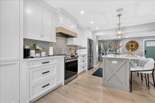 75 Shawglen Way Sw, Calgary, AB - Indoor Photo Showing Kitchen With Upgraded Kitchen