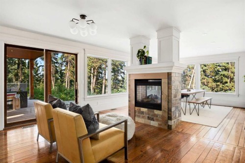 15 Elbow River Point, Rural Rocky View County, AB - Indoor Photo Showing Living Room With Fireplace