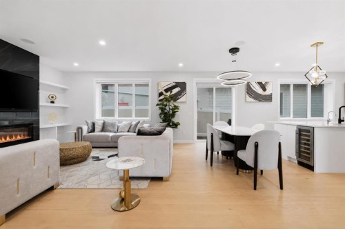 105 Rockhaven Green Nw, Calgary, AB - Indoor Photo Showing Other Room With Fireplace