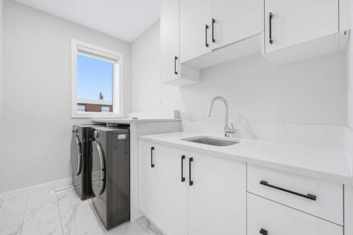 105 Rockhaven Green Nw, Calgary, AB - Indoor Photo Showing Laundry Room