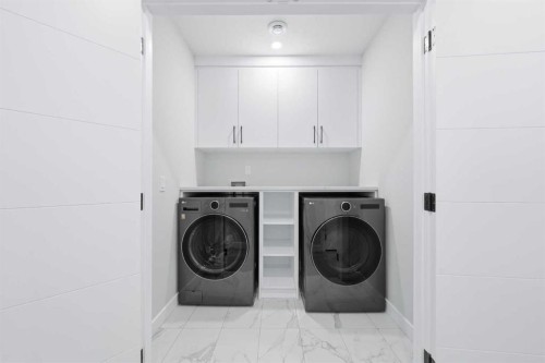 105 Rockhaven Green Nw, Calgary, AB - Indoor Photo Showing Laundry Room