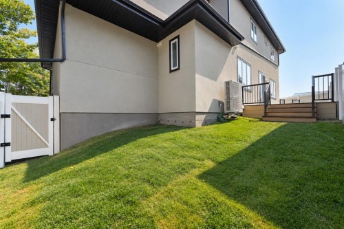 105 Rockhaven Green Nw, Calgary, AB - Outdoor With Deck Patio Veranda With Exterior