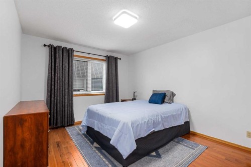 1114 Whitfield Avenue, Crossfield, AB - Indoor Photo Showing Bedroom