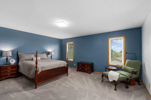1114 Whitfield Avenue, Crossfield, AB - Indoor Photo Showing Bedroom