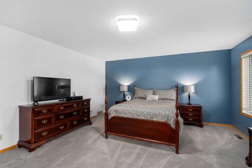 1114 Whitfield Avenue, Crossfield, AB - Indoor Photo Showing Bedroom