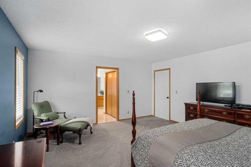 1114 Whitfield Avenue, Crossfield, AB - Indoor Photo Showing Bedroom
