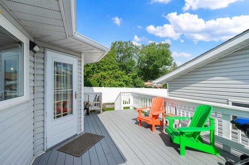 1114 Whitfield Avenue, Crossfield, AB - Outdoor With Deck Patio Veranda With Exterior