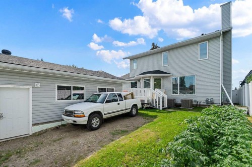 1114 Whitfield Avenue, Crossfield, AB - Outdoor With Exterior
