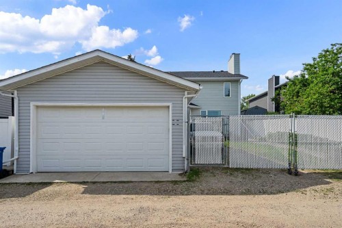 1114 Whitfield Avenue, Crossfield, AB - Outdoor With Exterior