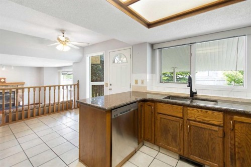 32 Del Rio Place Ne, Calgary, AB - Indoor Photo Showing Kitchen With Double Sink