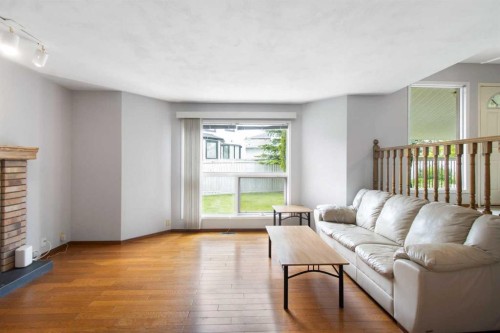 32 Del Rio Place Ne, Calgary, AB - Indoor Photo Showing Living Room With Fireplace