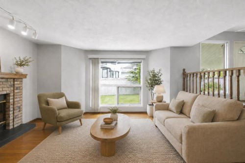32 Del Rio Place Ne, Calgary, AB - Indoor Photo Showing Living Room With Fireplace