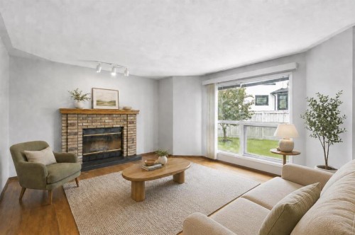 32 Del Rio Place Ne, Calgary, AB - Indoor Photo Showing Living Room With Fireplace