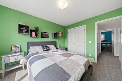 4 Drake Landing Gate, Okotoks, AB - Indoor Photo Showing Bedroom
