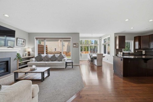 4 Drake Landing Gate, Okotoks, AB - Indoor Photo Showing Living Room With Fireplace