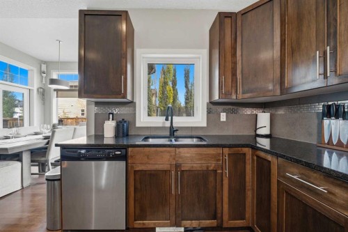 4 Drake Landing Gate, Okotoks, AB - Indoor Photo Showing Kitchen With Double Sink