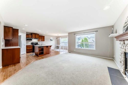 80 Eversyde Way Sw, Calgary, AB - Indoor With Fireplace