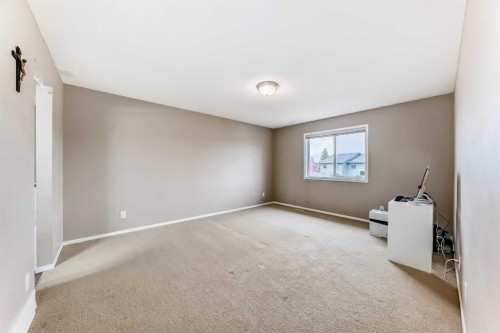 80 Eversyde Way Sw, Calgary, AB - Indoor Photo Showing Other Room