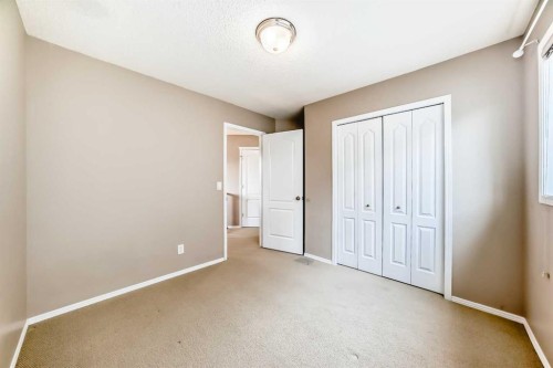 80 Eversyde Way Sw, Calgary, AB - Indoor Photo Showing Other Room