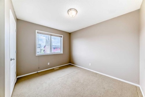 80 Eversyde Way Sw, Calgary, AB - Indoor Photo Showing Other Room