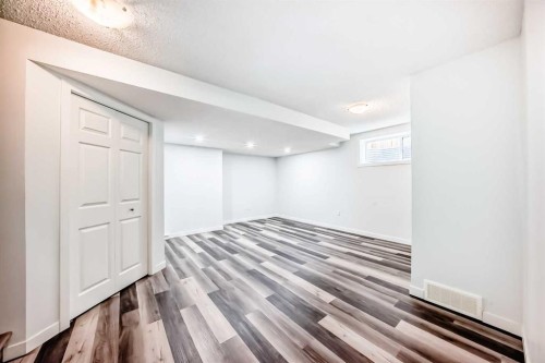 80 Eversyde Way Sw, Calgary, AB - Indoor Photo Showing Other Room